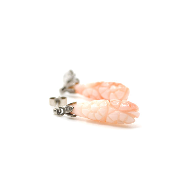 Aros de coral tallado