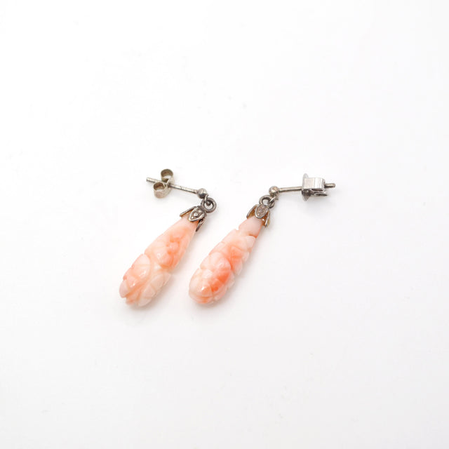 Aros de coral tallado