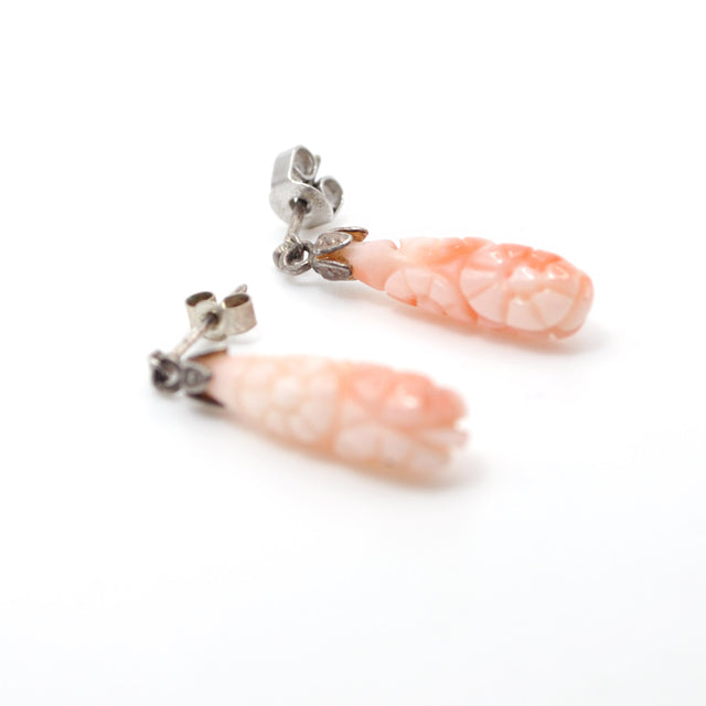 Aros de coral tallado