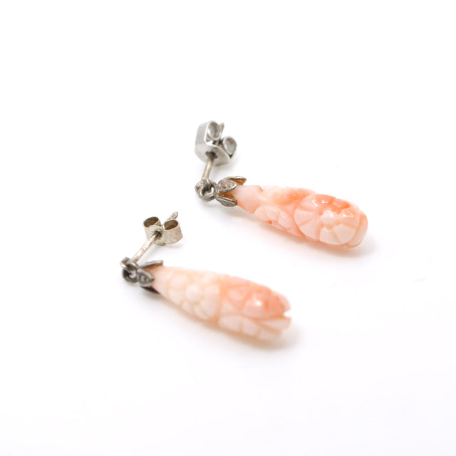Aros de coral tallado