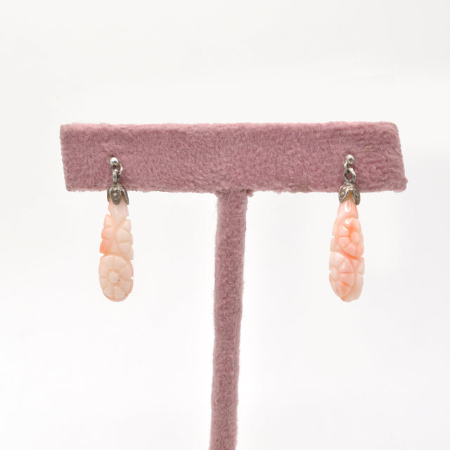 Aros de coral tallado