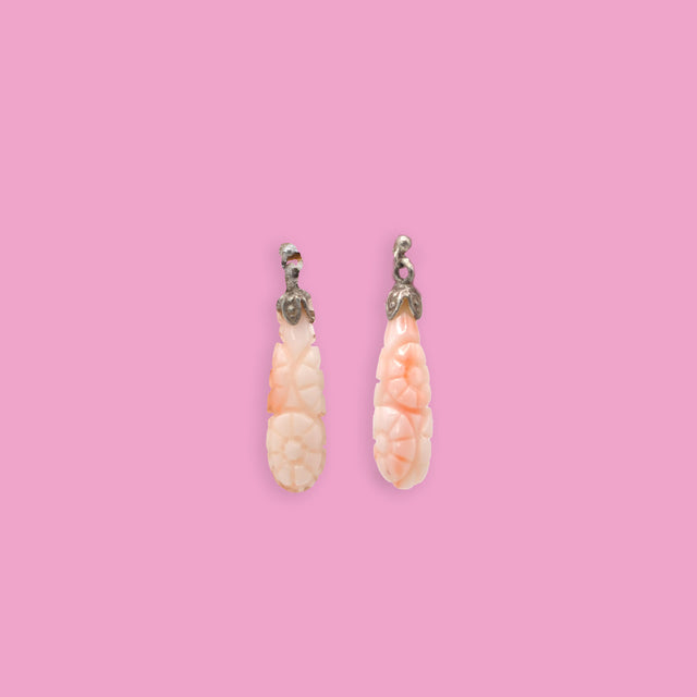 Aros de coral tallado
