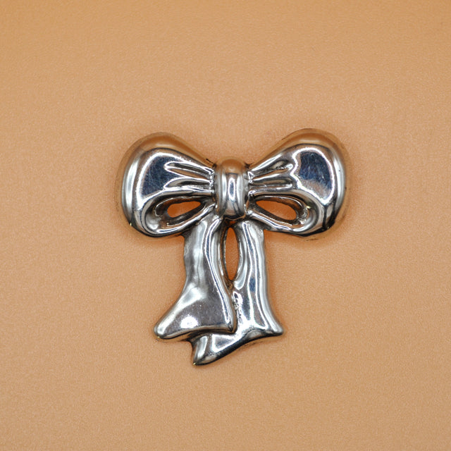 Broche lacito de plata