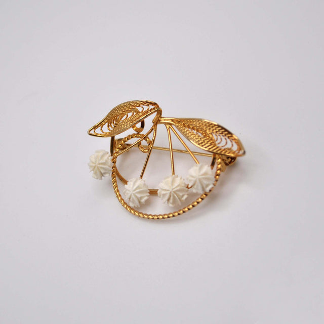 Broche filigrana hueso